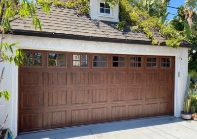 Clopay Gallery Steel SP in Walnut and Clear SQ22 Windows